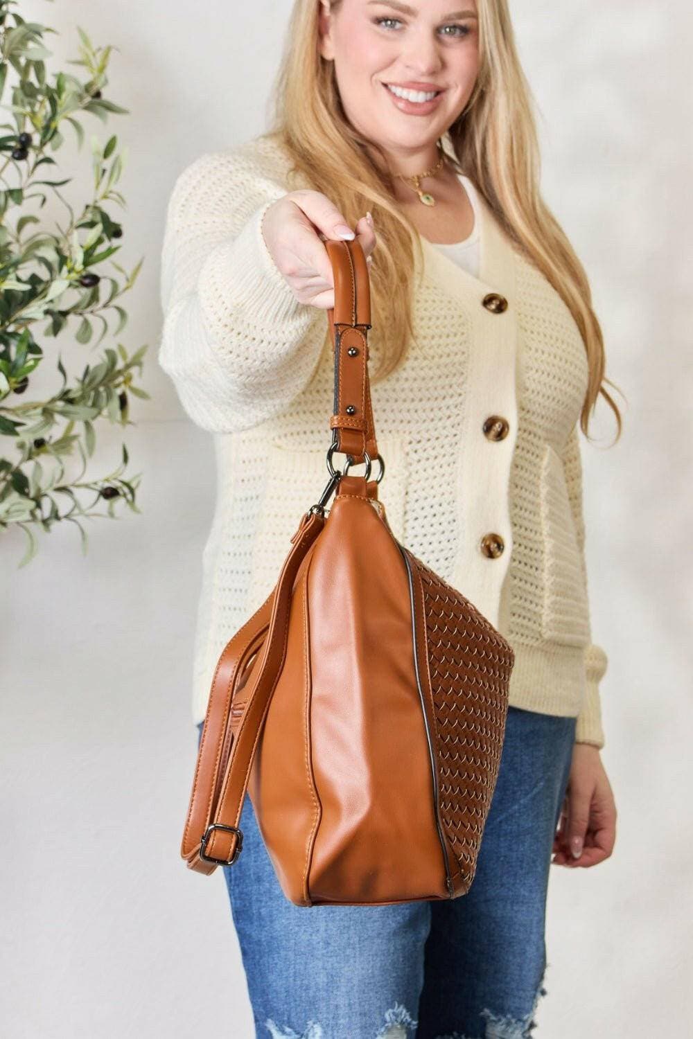 Stylish handcrafted vegan leather shoulder bag with unique woven design