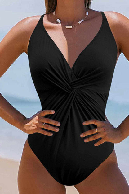 Elegant Crisscross V-Neck Swimsuit with twist front and ruched design.