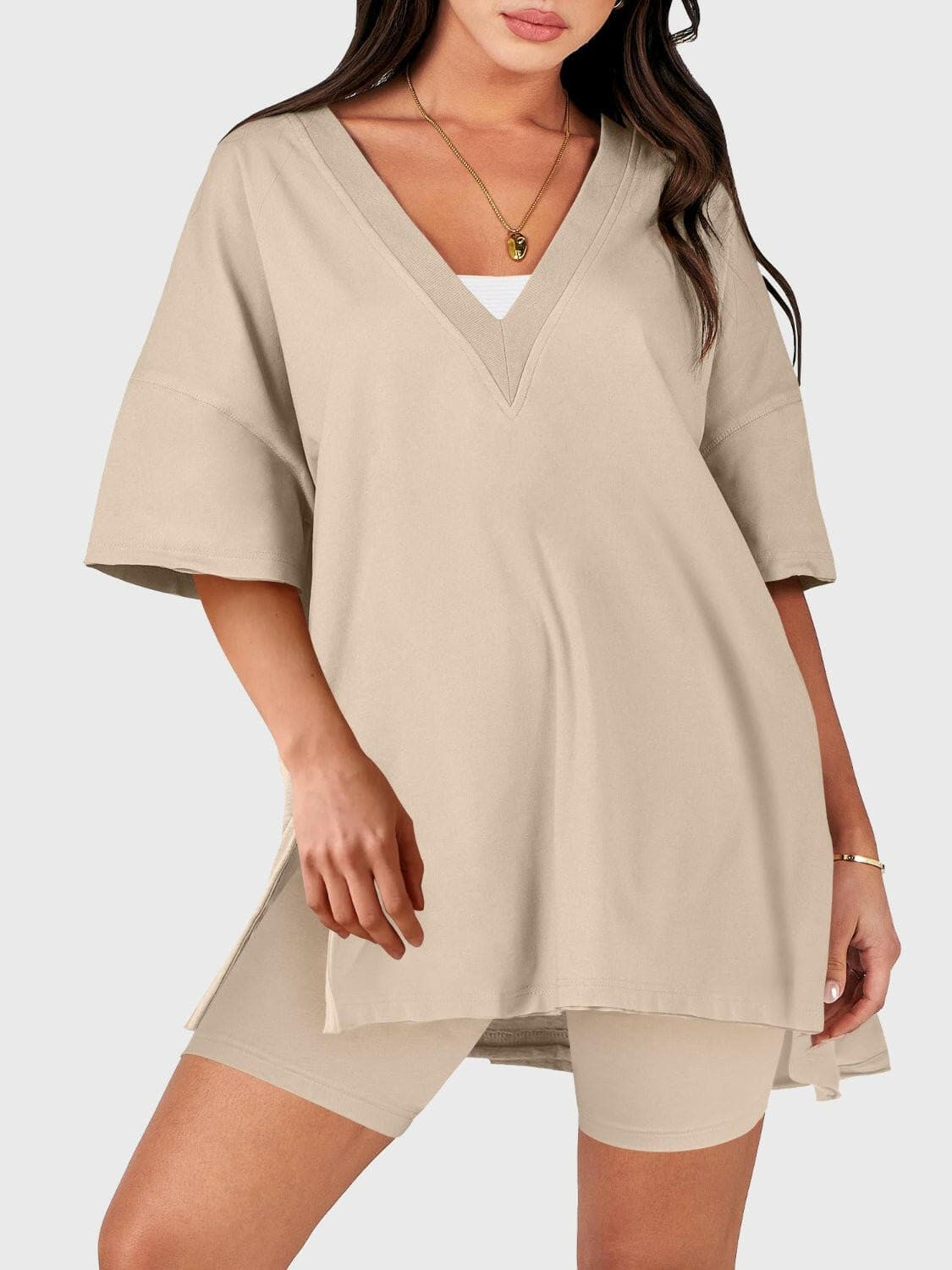 Stylish V-Neck Top and Shorts DuoStylish V-Neck Top and Shorts Duo
 Upgrade your style with our Stylish V-Neck Top and Shorts Duo, a versatile two-piece set that combines chic elegance with comfort.Love Salve -Neck Topjust arrived