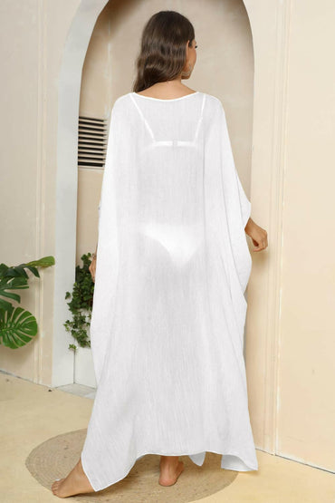 Beach Chic V-Neck Sheer Cover-UpUpgrade Your Beach Look with our Beach Chic V-Neck Sheer Cover-Up!
 Get ready to make a statement on the beach with our Beach Chic V-Neck Sheer Cover-Up. Whether youLove Salve -Neck Sheer Cover-swimwear