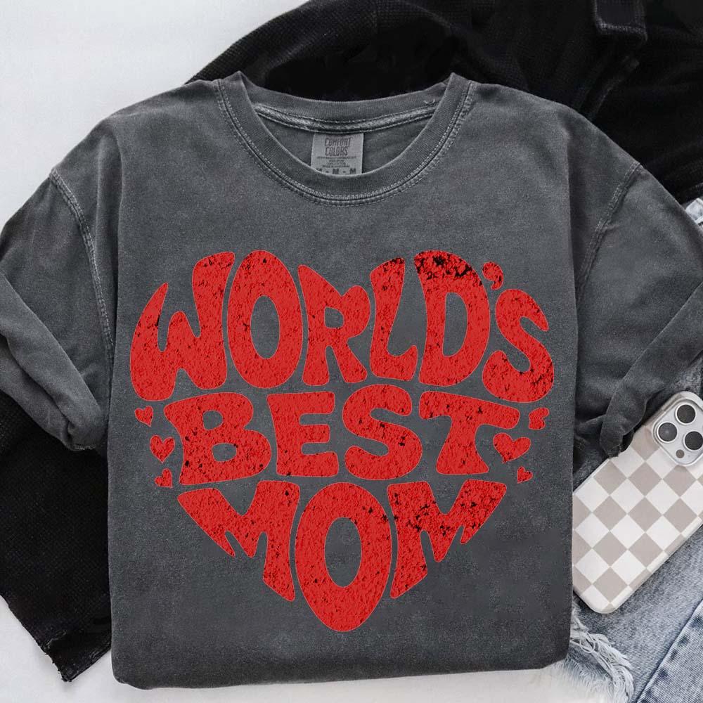 Adorb.co "World's Best Mom" T-shirt label detail, showing brand authenticity and quality for discerning shoppers.