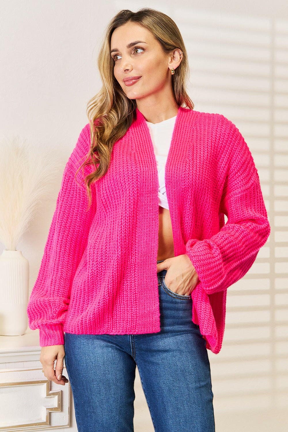 Cozy Chic Rib-Knit Cocoon Cardigan in bright pink, featuring a relaxed drop-shoulder design for effortless layering.