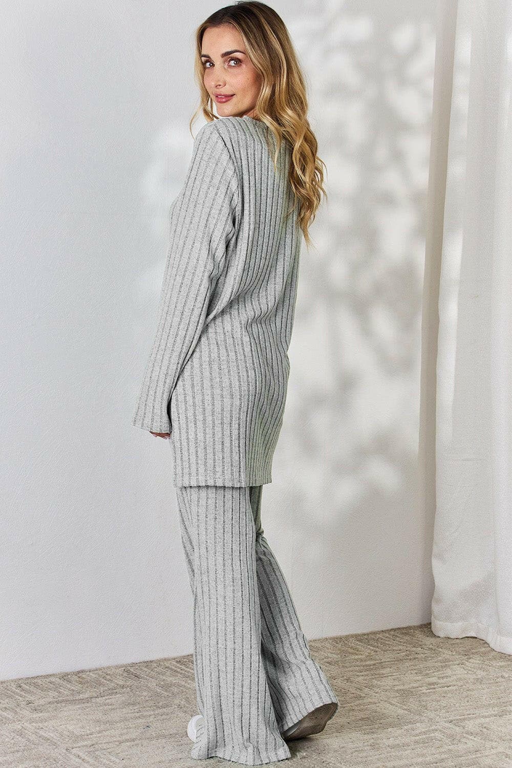 Elegant Ribbed Top and Wide Leg Pants EnsembleDiscover the Perfect Blend of Style and Comfort
 Introducing our Elegant Ribbed Top and Wide Leg Pants Ensemble - a must-have addition to your wardrobe that effortleLove Salve Wide Leg Pants EnsembleApparel