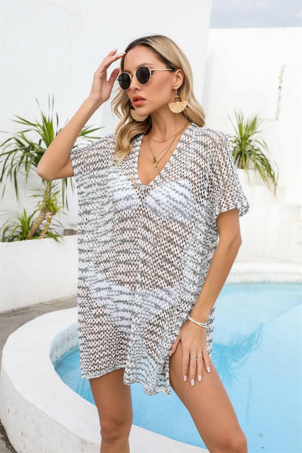 Sheer V-Neck Beach Cover-Up with Exquisite DetailSheer V-Neck Beach Cover-Up with Exquisite Detail
 Step into Beach Chic sophistication with our Sheer V-Neck Cover-Up
 Main Features:
 
 
Elevated Design: Stand out Love Salve -Neck Beach Cover-Apparel