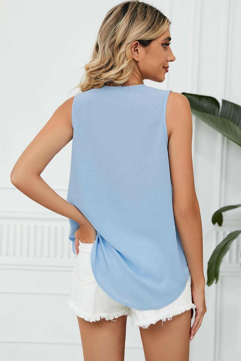 Elegant V-Neck Sleeveless Top with Wide StrapsExperience Timeless Elegance
 Step into sophistication with our Elegant V-Neck Sleeveless Top with Wide Straps. Crafted from luxurious 100% polyester, this top offerLove Salve -Neck Sleeveless TopApparel