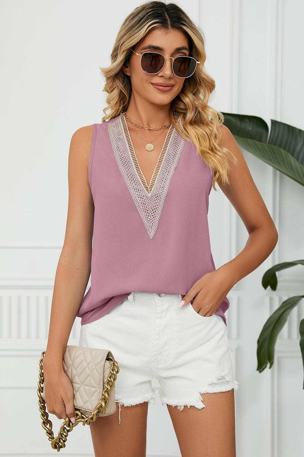 Elegant V-Neck Sleeveless Top with Wide StrapsExperience Timeless Elegance
 Step into sophistication with our Elegant V-Neck Sleeveless Top with Wide Straps. Crafted from luxurious 100% polyester, this top offerLove Salve -Neck Sleeveless TopApparel