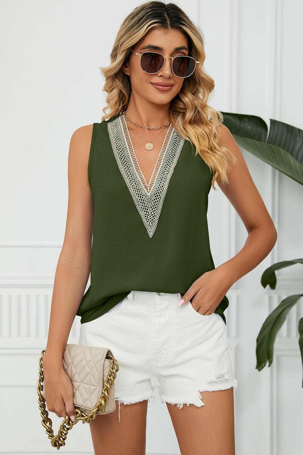 Elegant V-Neck Sleeveless Top with Wide StrapsExperience Timeless Elegance
 Step into sophistication with our Elegant V-Neck Sleeveless Top with Wide Straps. Crafted from luxurious 100% polyester, this top offerLove Salve -Neck Sleeveless TopApparel