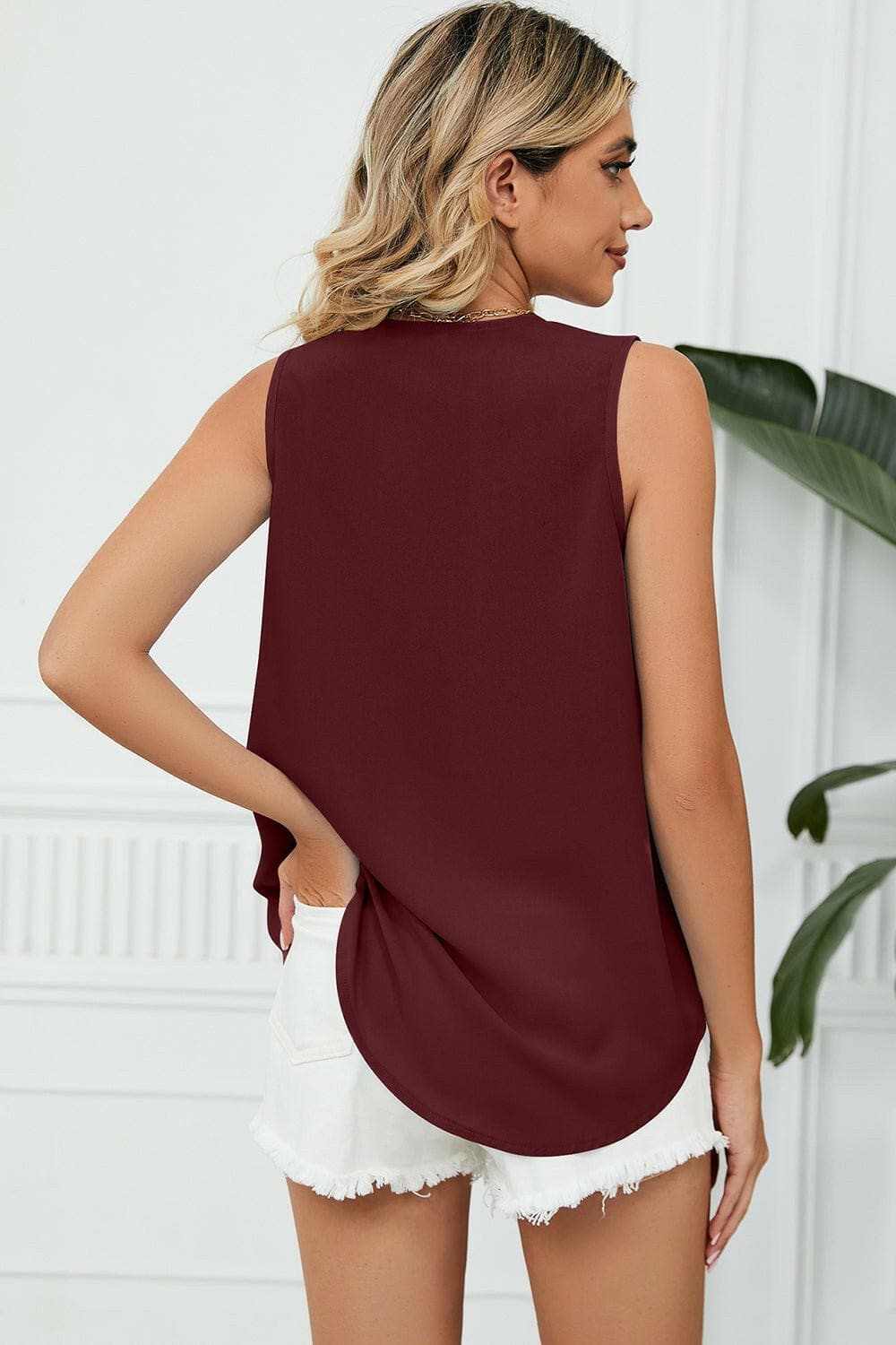 Elegant V-Neck Sleeveless Top with Wide StrapsExperience Timeless Elegance
 Step into sophistication with our Elegant V-Neck Sleeveless Top with Wide Straps. Crafted from luxurious 100% polyester, this top offerLove Salve -Neck Sleeveless TopApparel